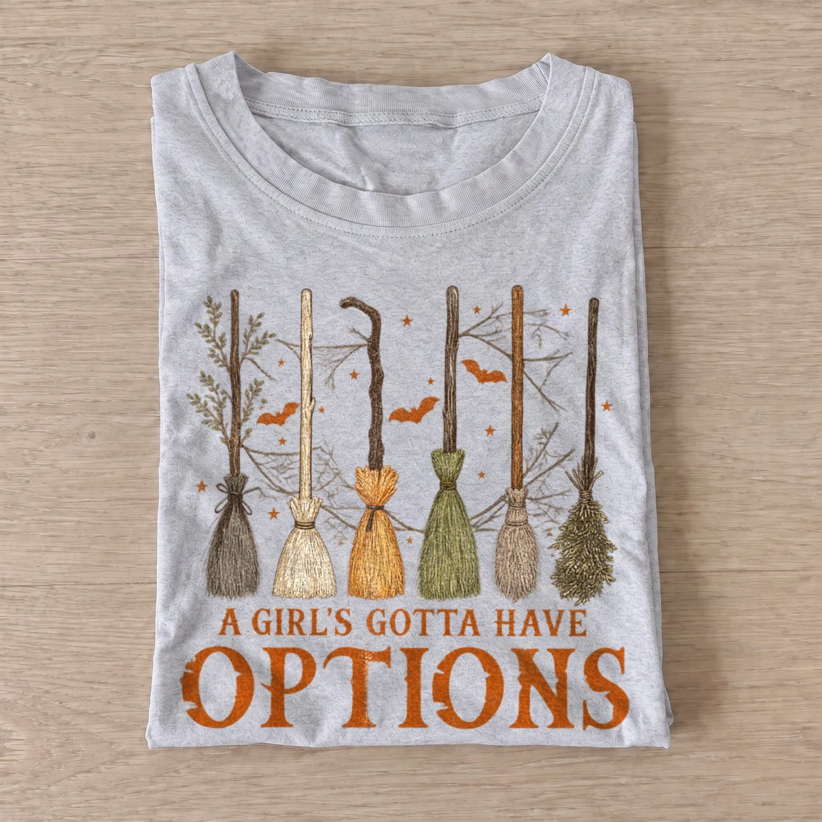 A girls gotta have options witch broom t shirt gray20witch broom options.webp
