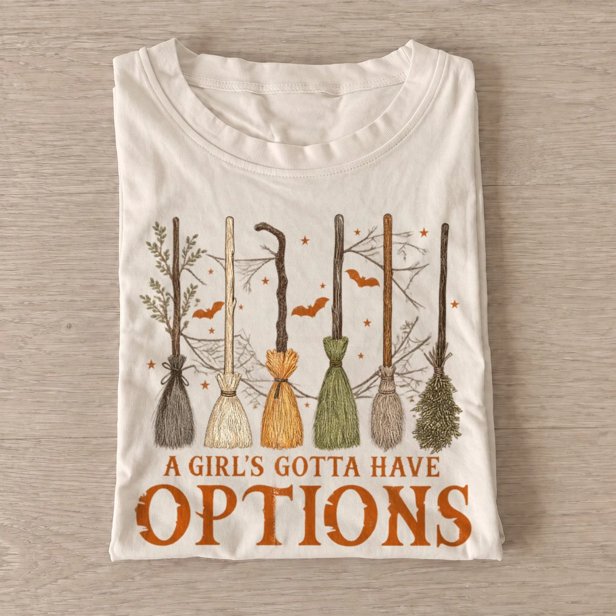 A girls gotta have options witch broom t shirt sand20witch broom options.webp