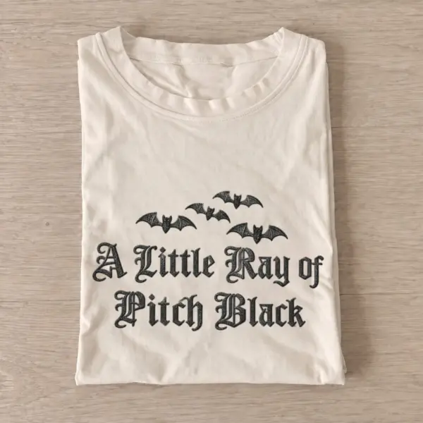 A little ray of pitch black t shirt sand20pitch black sunshine.webp