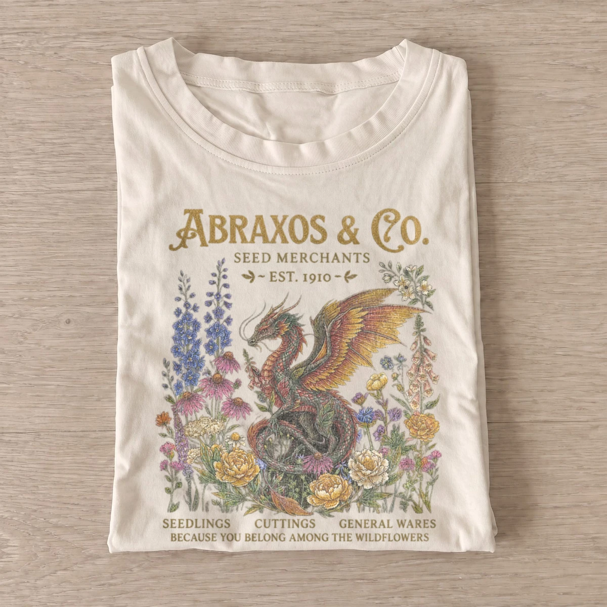Abraxos co. wyvern seed merchants t shirt sand20wyvern seed merchants.webp
