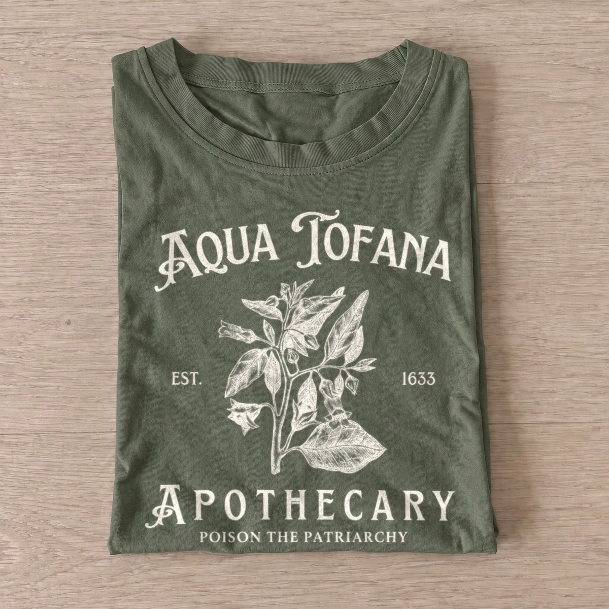 Aqua tofana apothecary poison the patriarchy t shirt olive20poison apothecary.webp