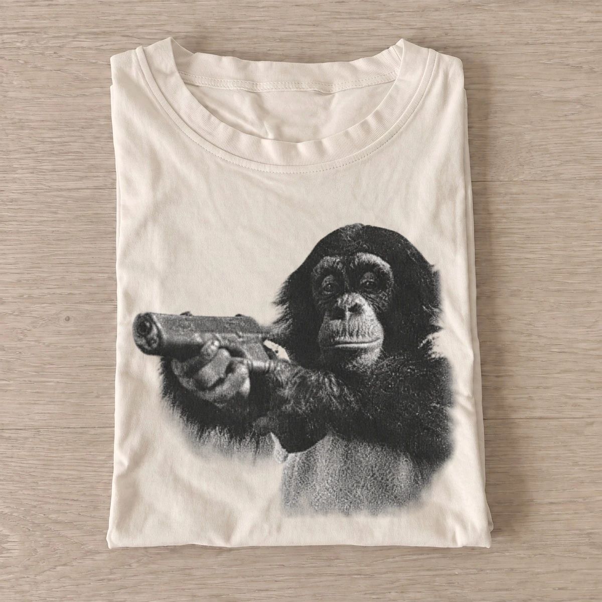 Armed chimpanzee graphic t shirt sand20armed chimpanzee.webp