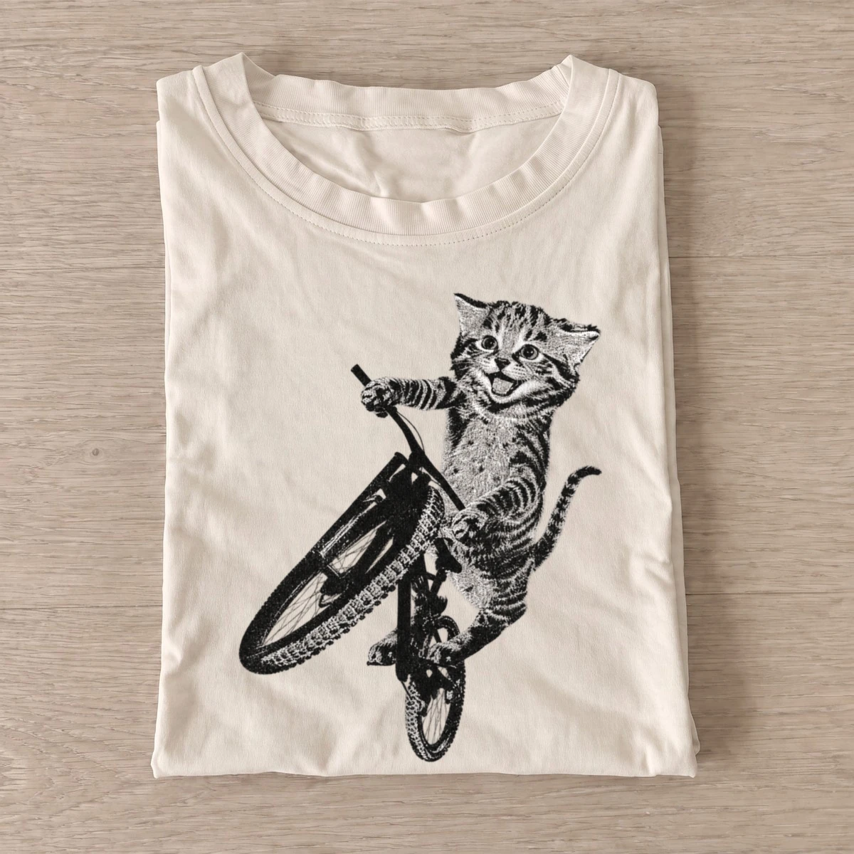 Bmx riding kitten graphic t shirt sand20bmx kitten.webp