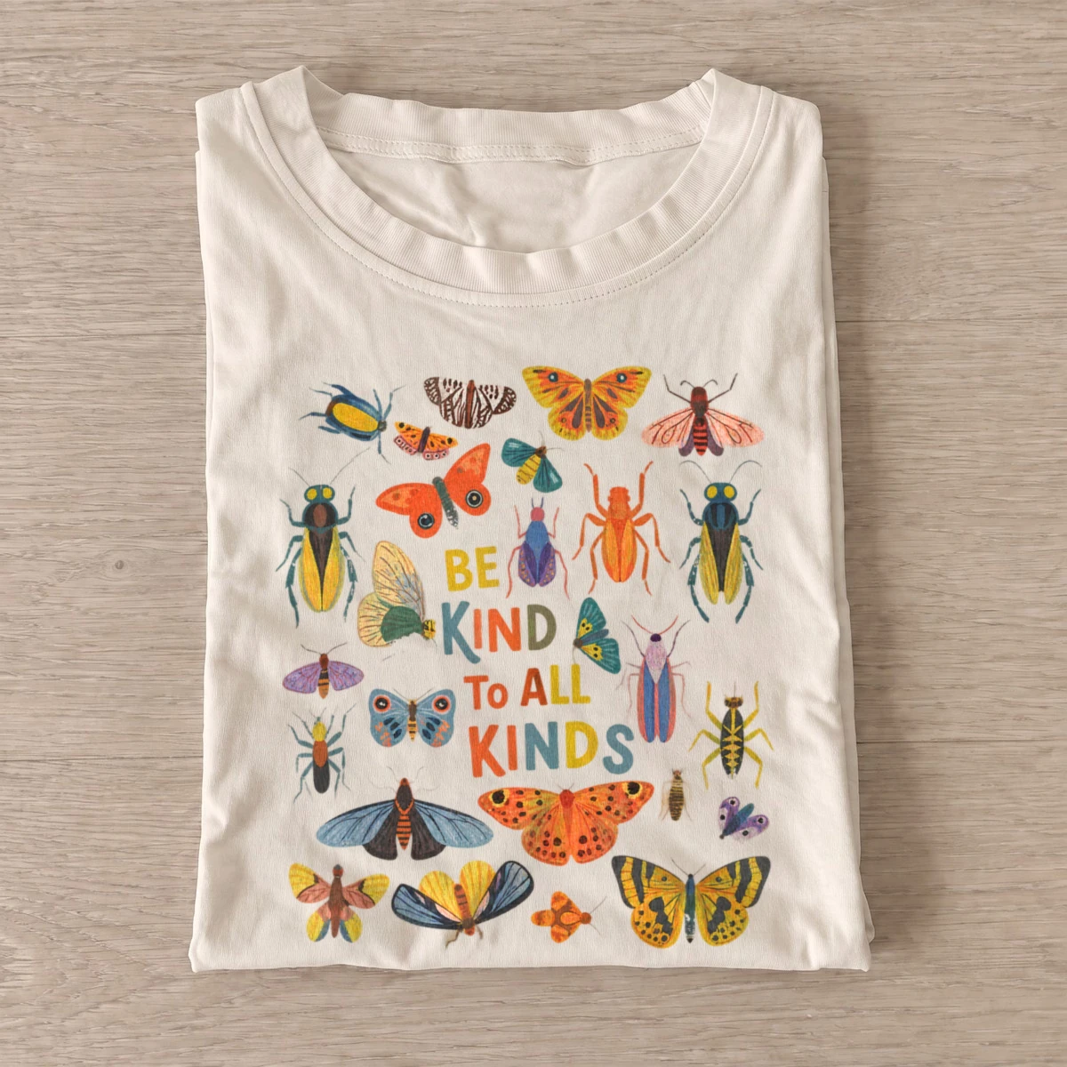 Be kind to all kinds bugs t shirt sand20be kind bugs.webp