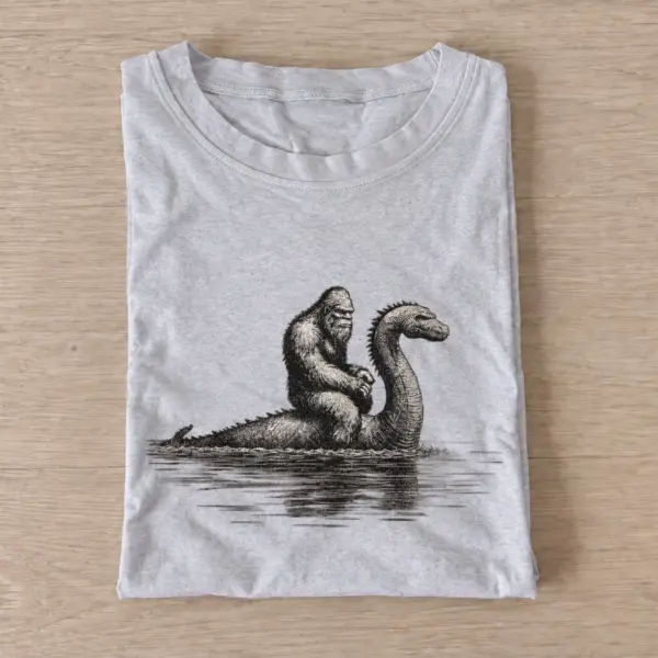 Bigfoot riding loch ness monster t shirt gray20river otter.webp