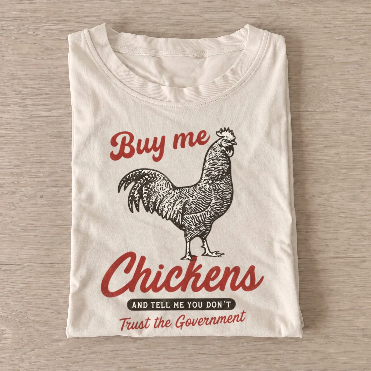 Buy me chickens trust the government t shirt sand20buy me chickens.webp