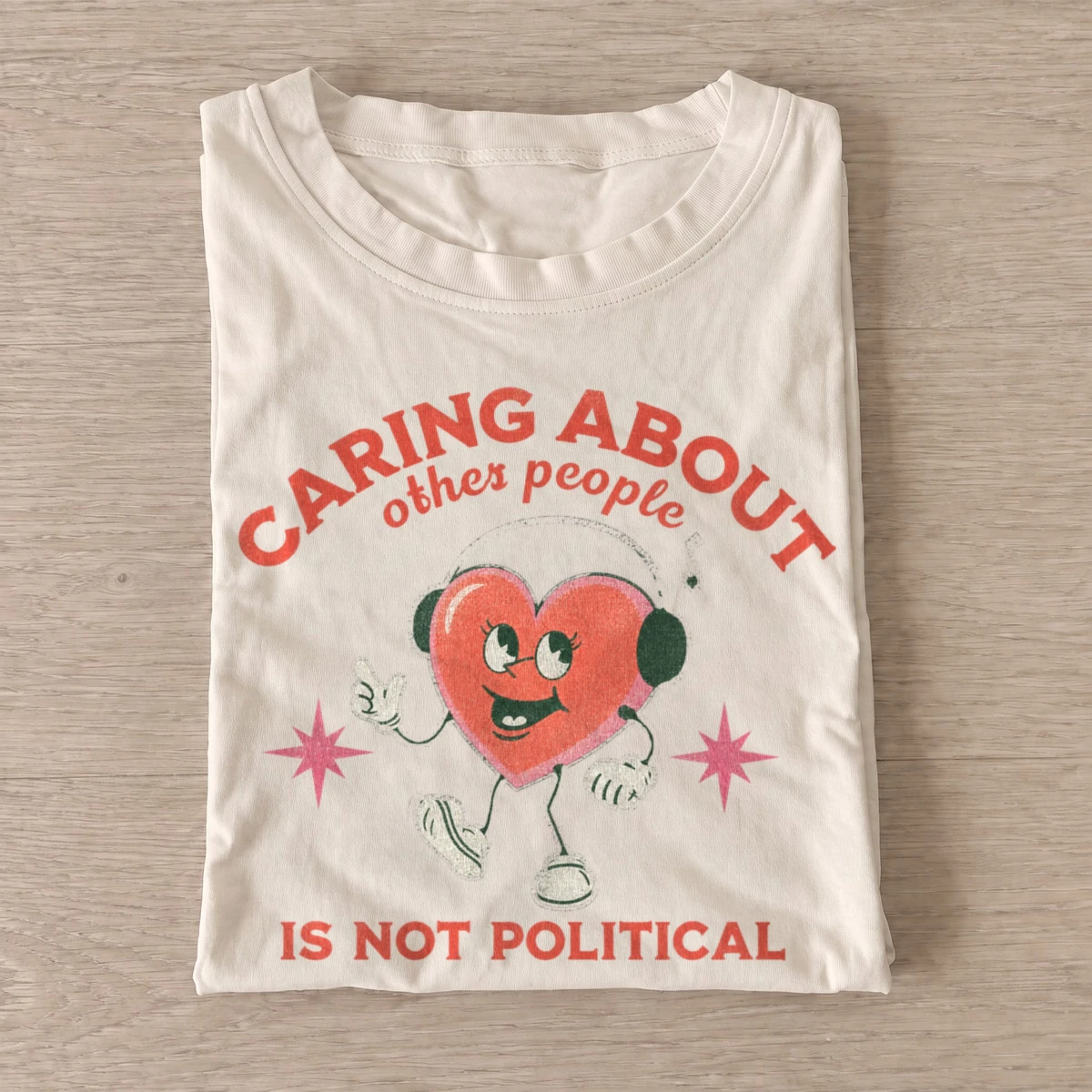Caring about other people is not political t shirt sand20caring isnt political.webp