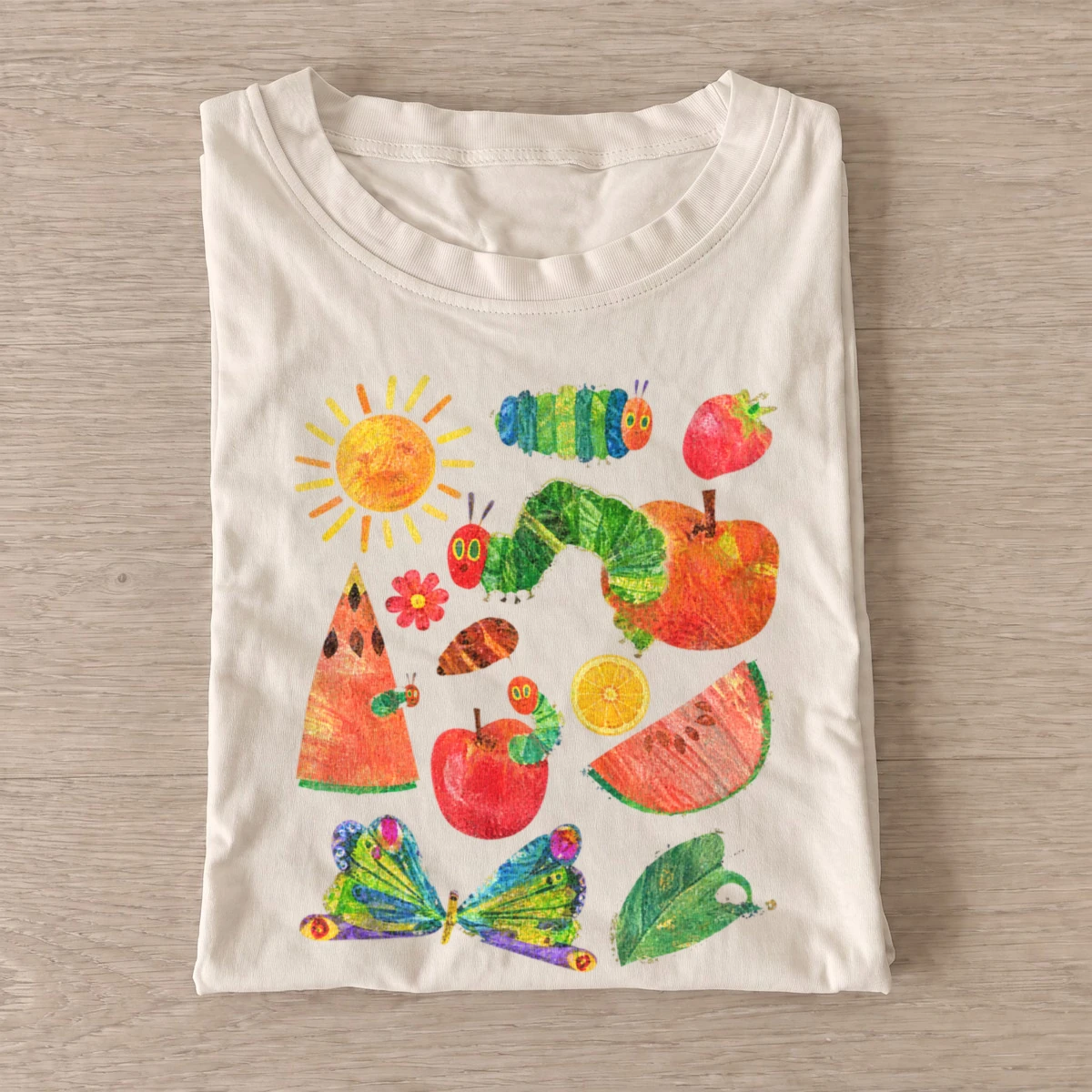 Caterpillar fruit feast graphic t shirt sand20caterpillar fruit feast.webp