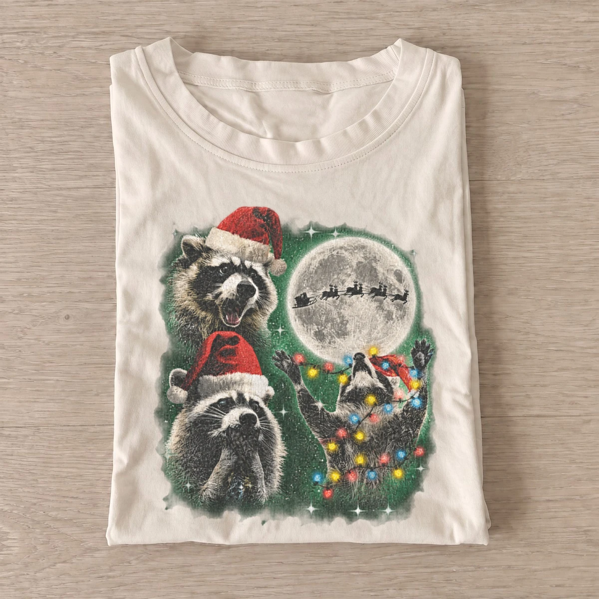 Cosmic christmas raccoons t shirt sand20cosmic christmas raccoons.webp