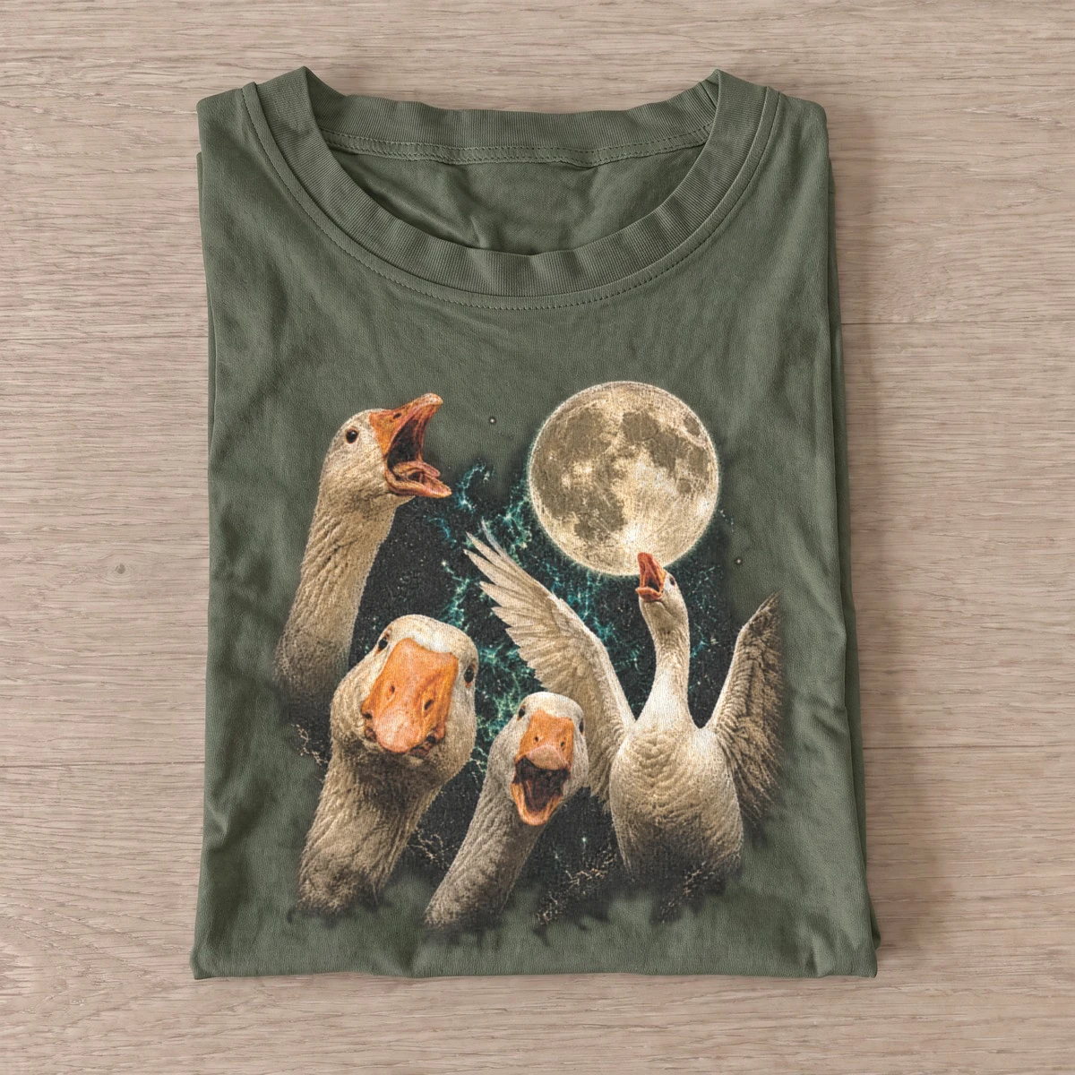 Cosmic geese moon graphic t shirt olive20cosmic geese.webp