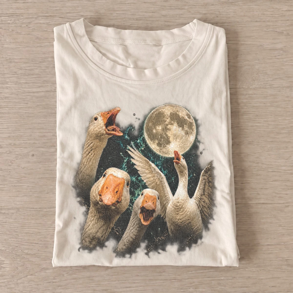 Cosmic geese moon graphic t shirt sand20cosmic geese.webp