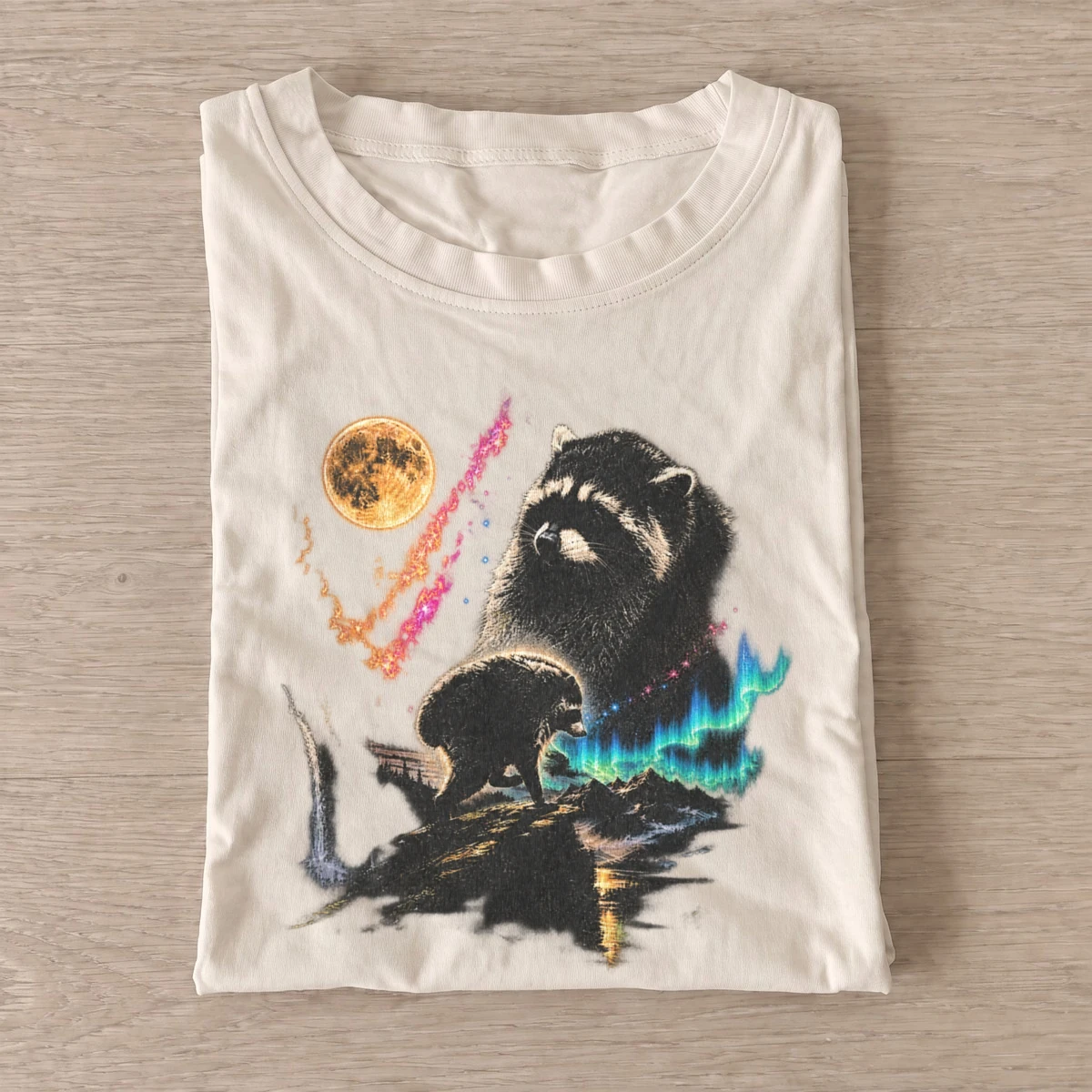 Cosmic otter aurora graphic t shirt sand20cosmic otter.webp