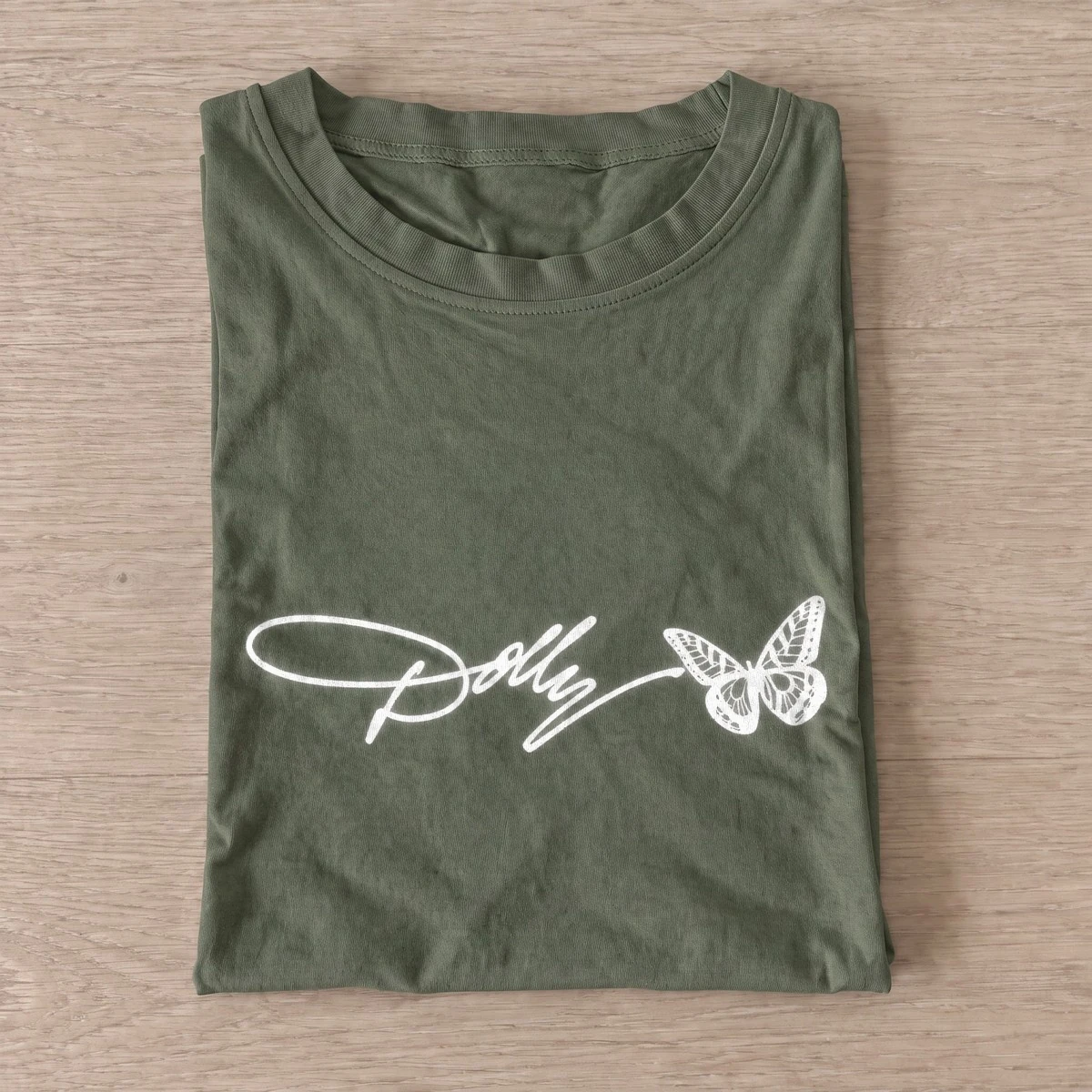 Dolly butterfly autograph t shirt olive20butterfly autograph.webp