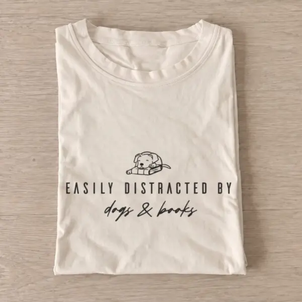 Easily distracted by dogs and books t shirt sand20dogs and books.webp