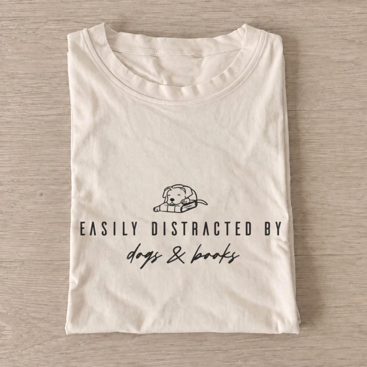 Easily distracted by dogs and books t shirt sand20dogs and books.webp