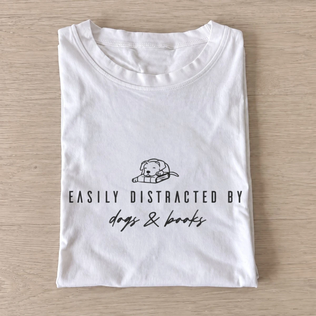 Easily distracted by dogs and books t shirt white20dogs and books.webp