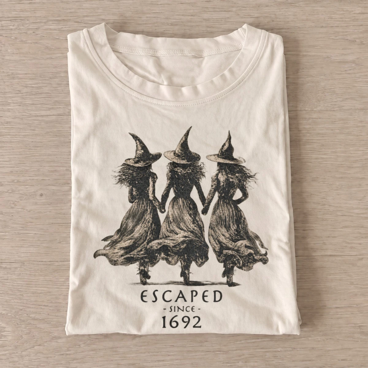 Escaped since 1692 witches t shirt sand20escaped witch raccoons.webp