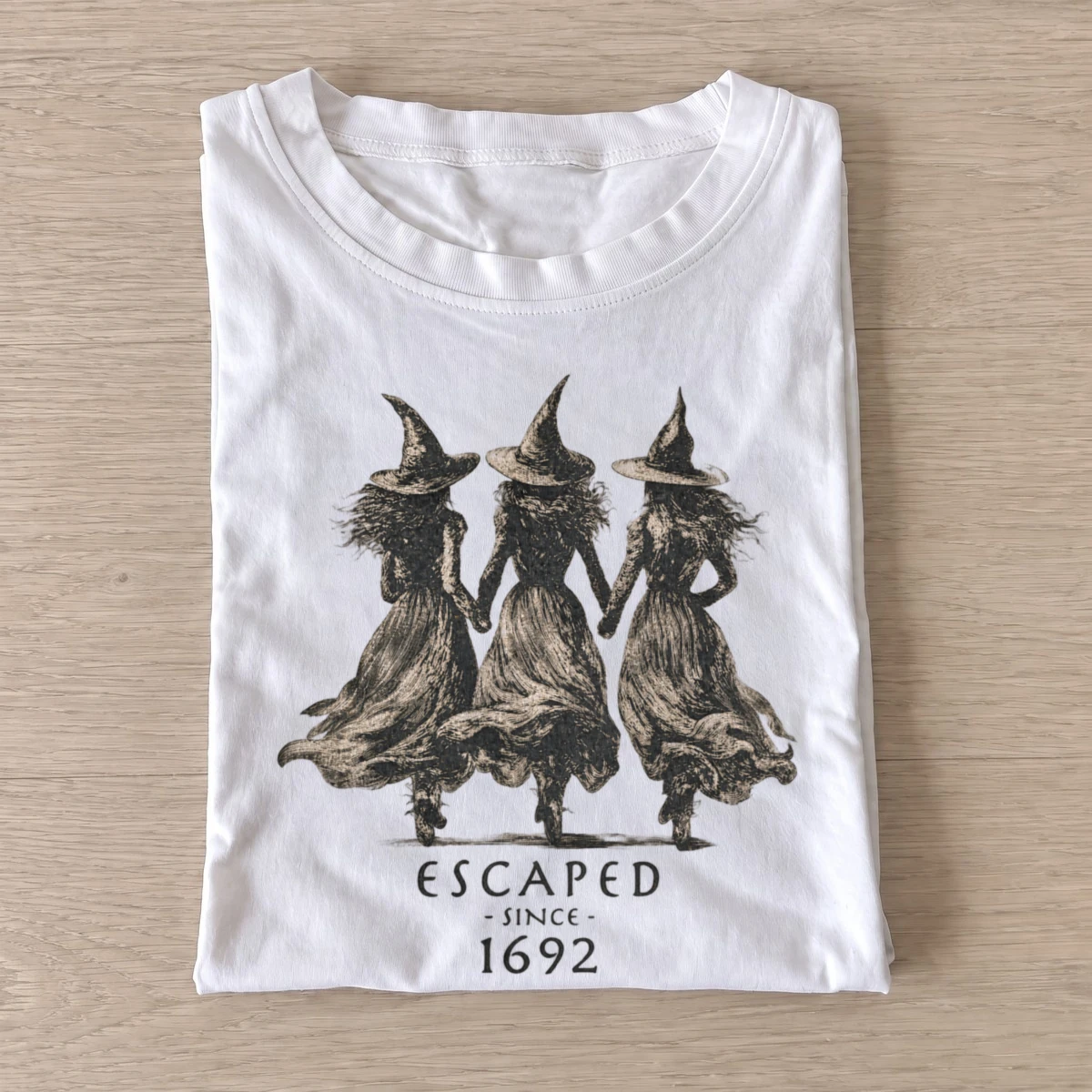 Escaped since 1692 witches t shirt white20escaped witch raccoons.webp
