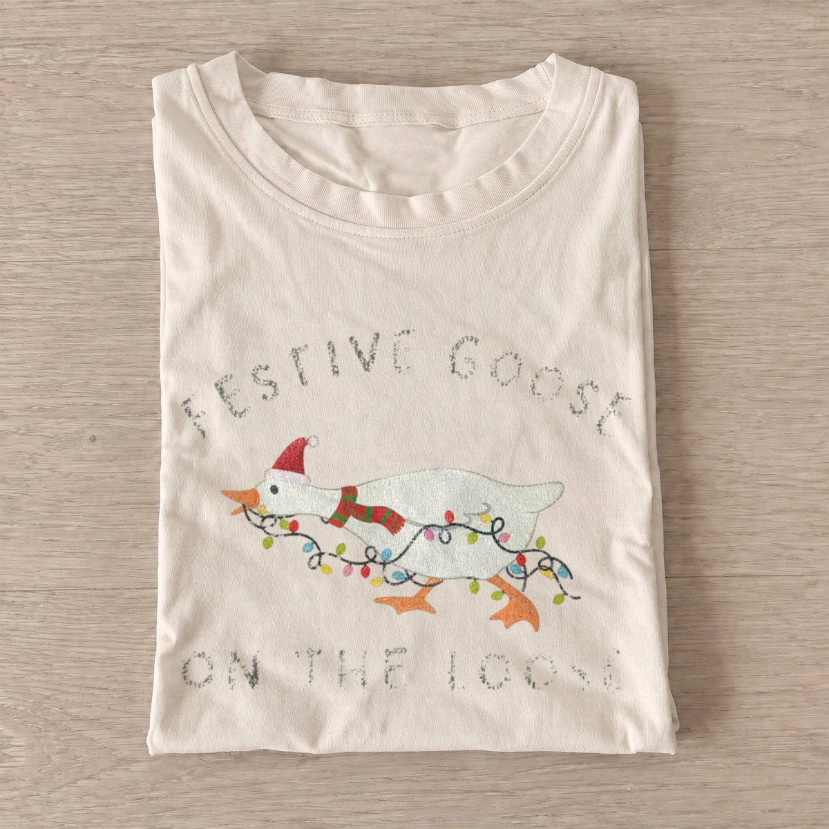 Festive goose on the loose t shirt sand20festive goose loose.webp
