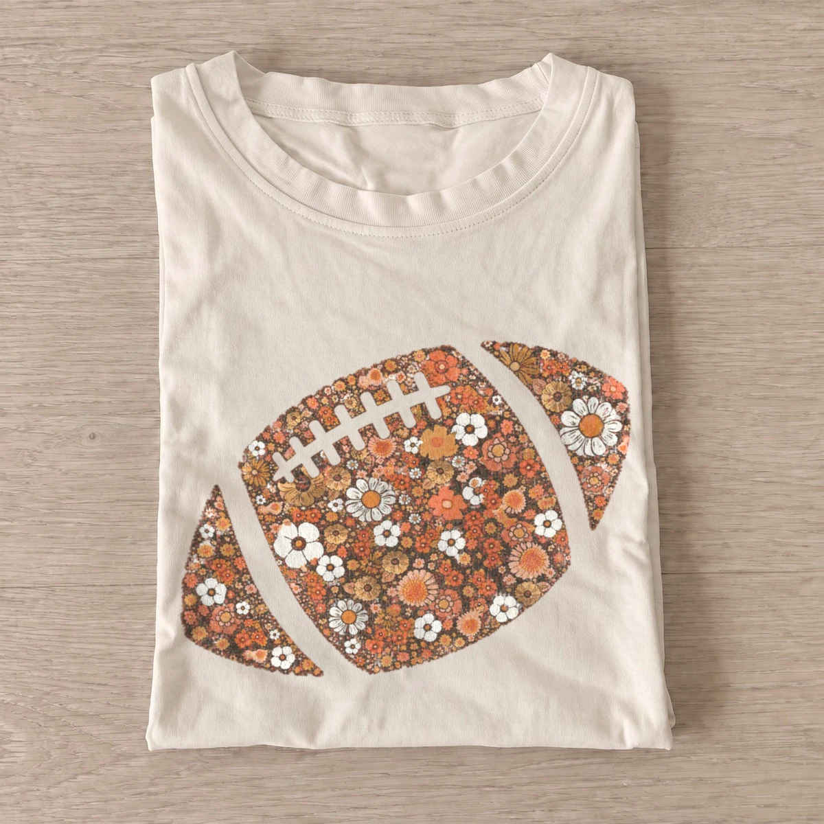 Floral football t shirt sand20floral football.webp