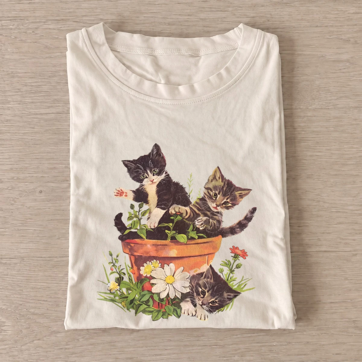 Flowerpot kitten trio t shirt sand20flowerpot kitten trio.webp