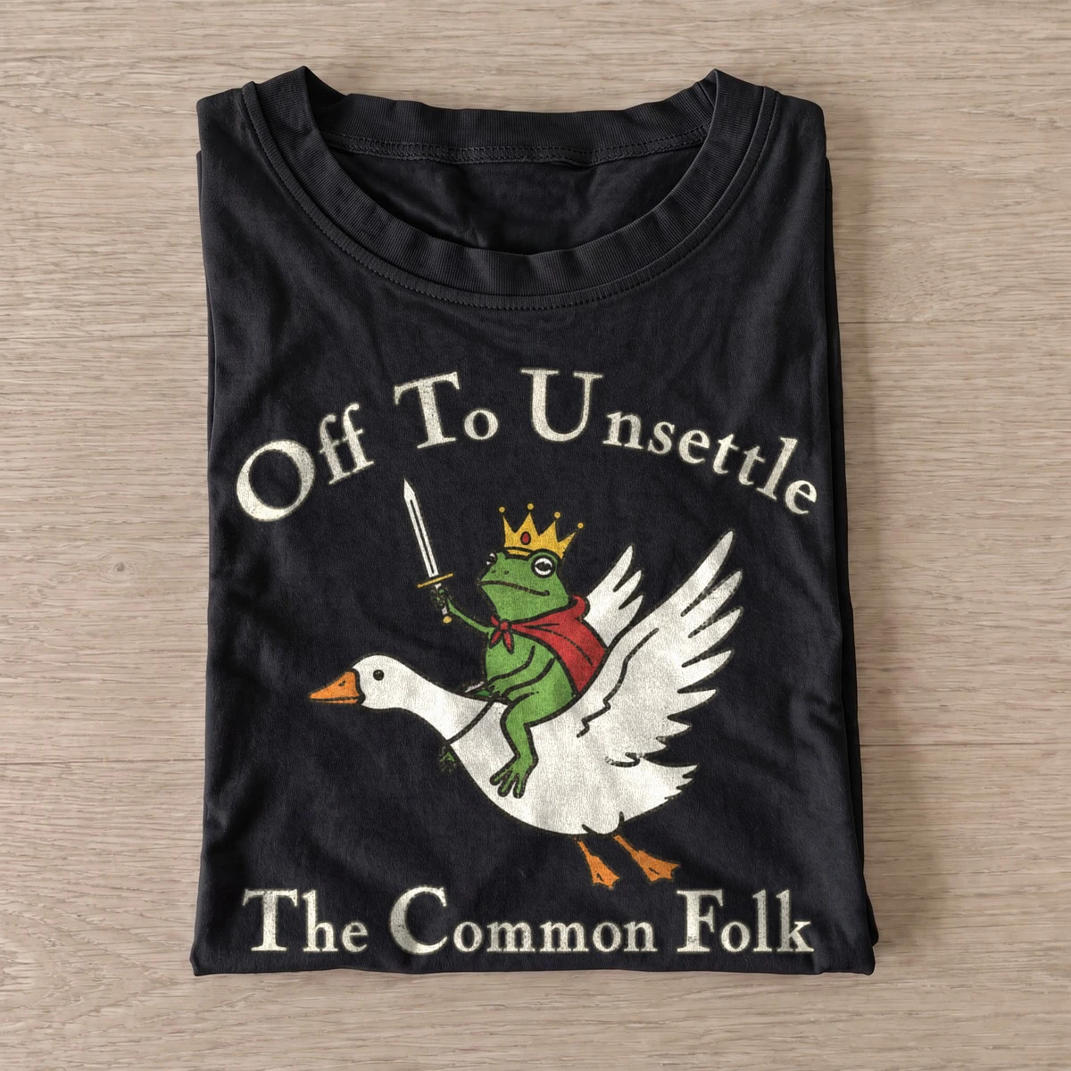 Frog king goose rider off to unsettle t shirt black20frog king goose rider.webp