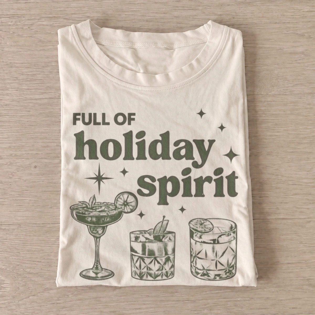Full of holiday spirit cocktail graphic t shirt sand20holiday spirits.webp