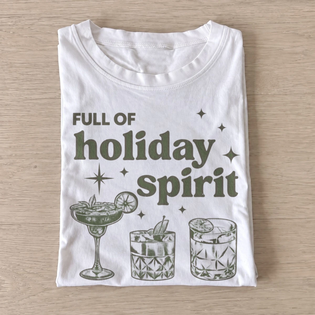 Full of holiday spirit cocktail graphic t shirt white20holiday spirits.webp