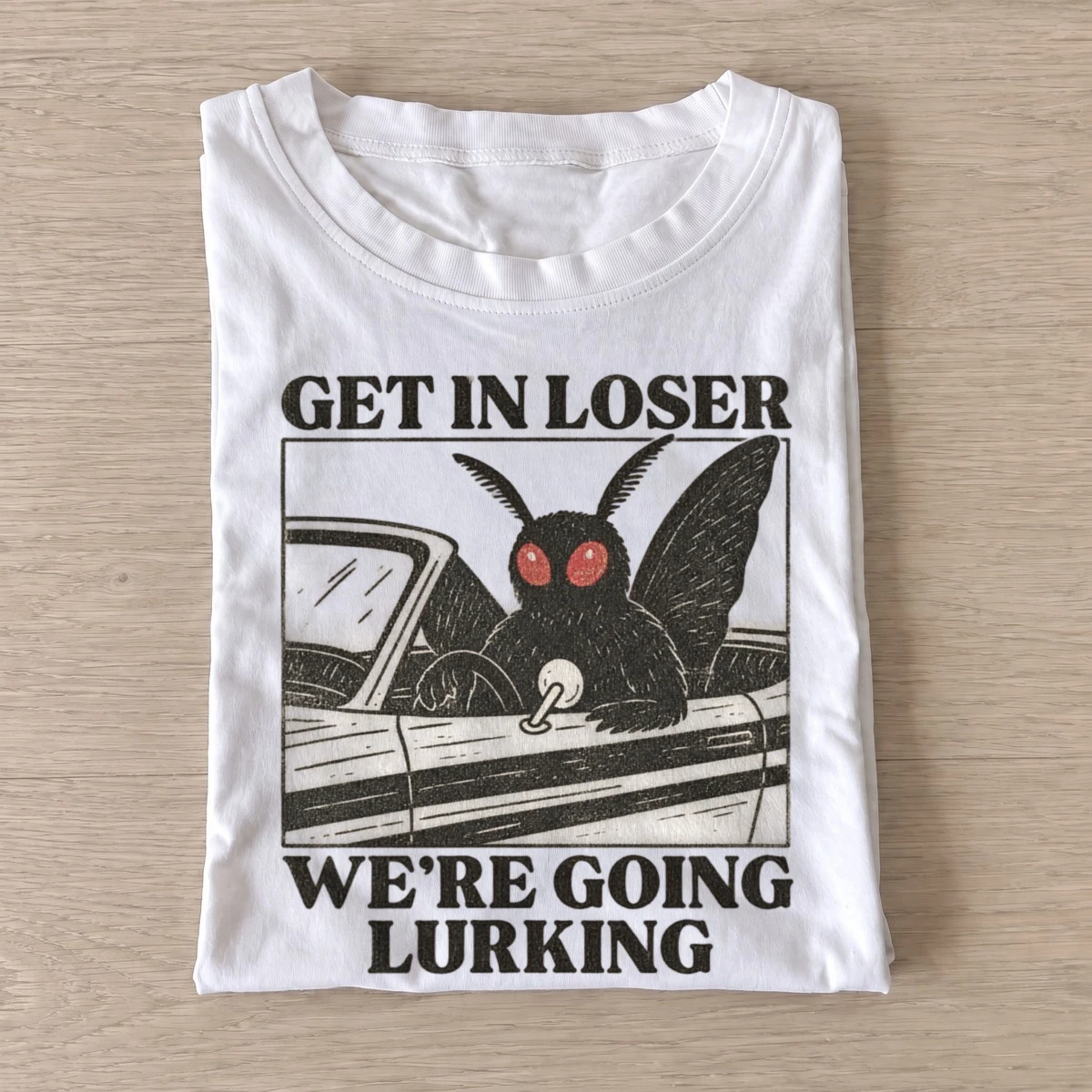 Get in loser were going lurking mothman t shirt white20mothman lurking.webp
