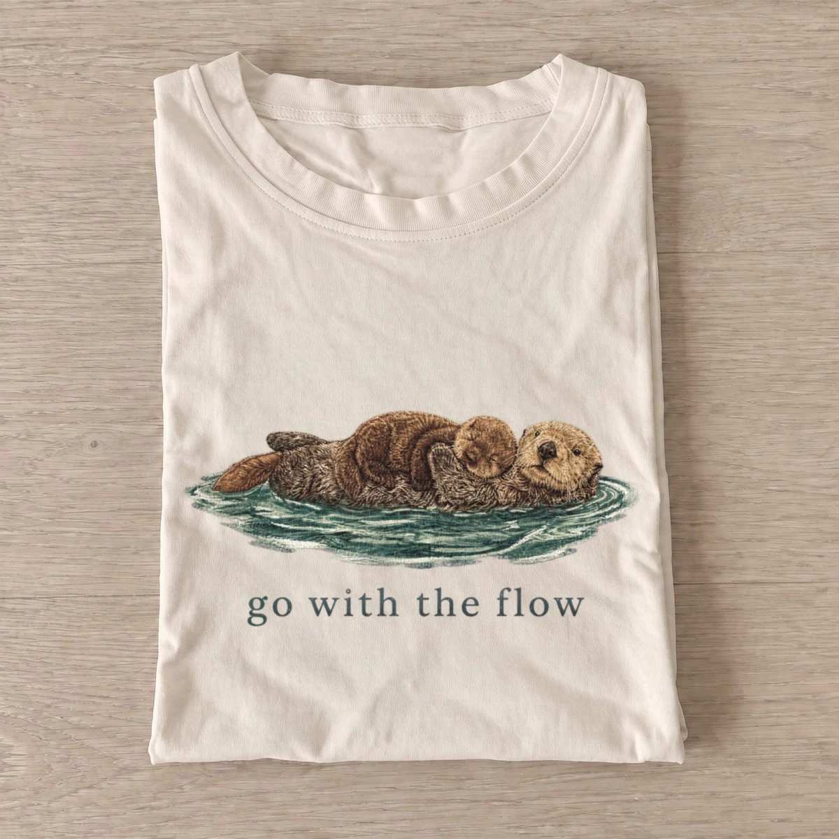 Go with the flow otters t shirt sand20flow with otters.webp