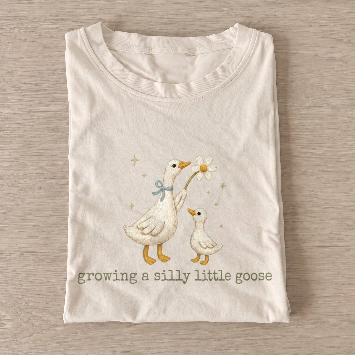 Growing a silly little goose t shirt sand20growing little goose.webp
