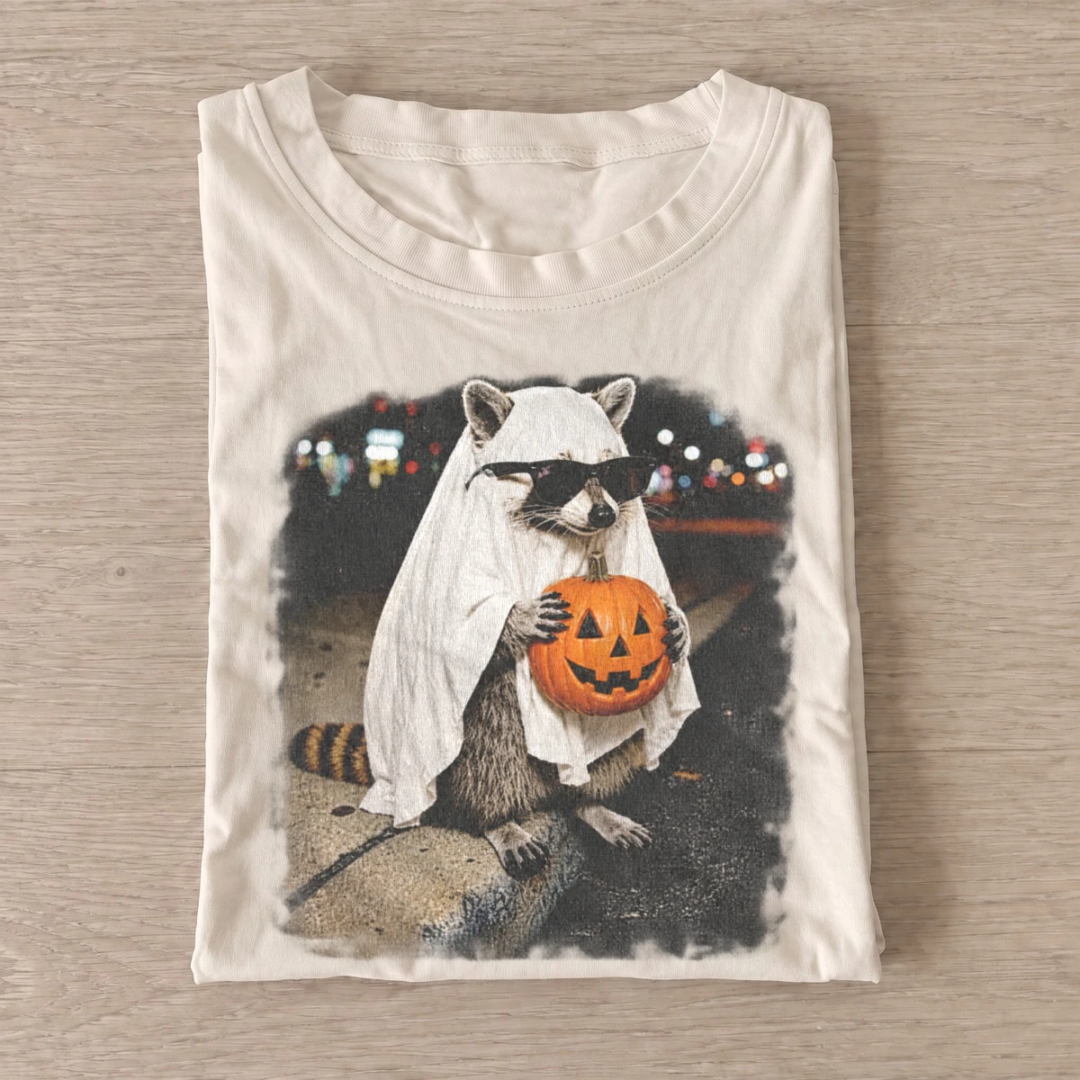 Halloween ghost raccoon with pumpkin t shirt sand20pumpkin ghost raccoon.webp