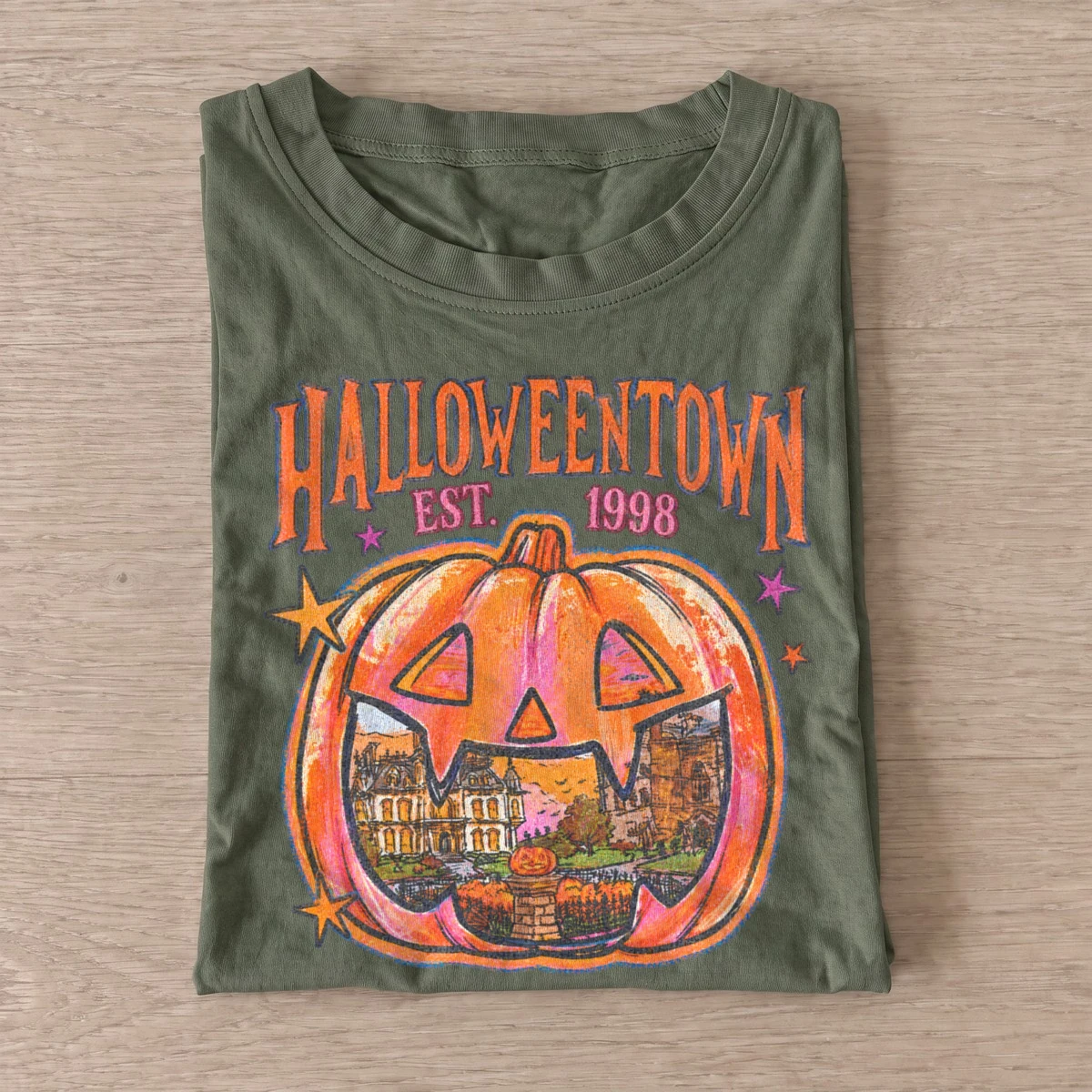 Halloweentown est 1998 pumpkin badge t shirt olive20pumpkin town badge.webp