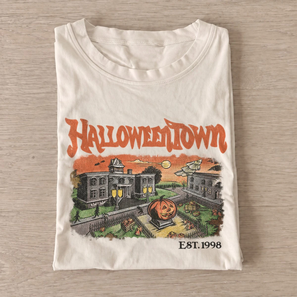 Halloweentown est. 1998 town square t shirt sand20haunted town square.webp
