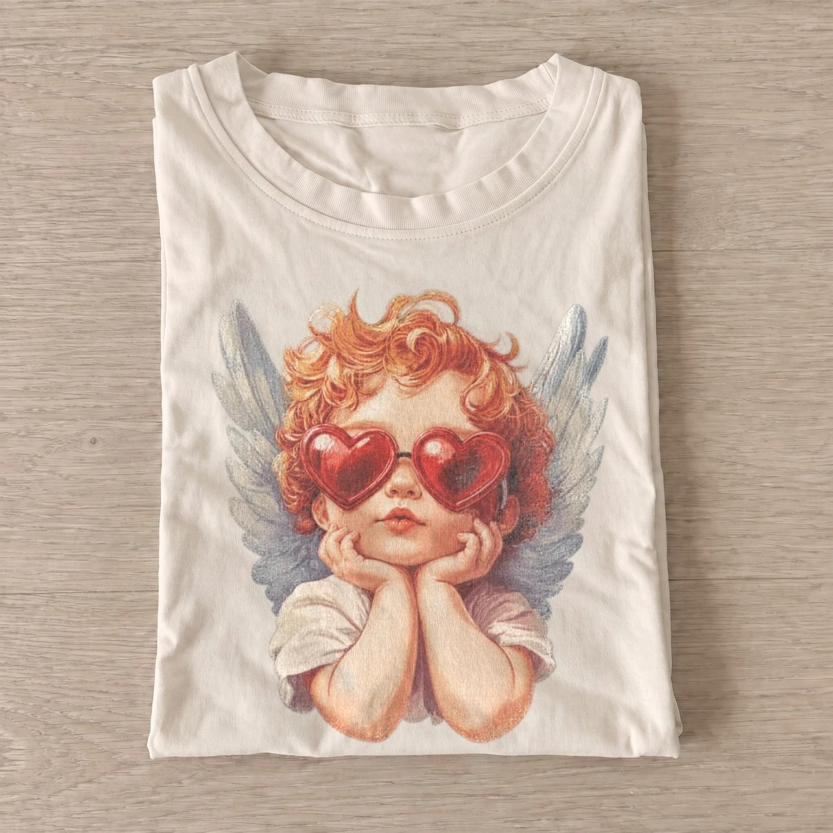 Heart glasses cherub t shirt sand20heart glasses cherub.webp