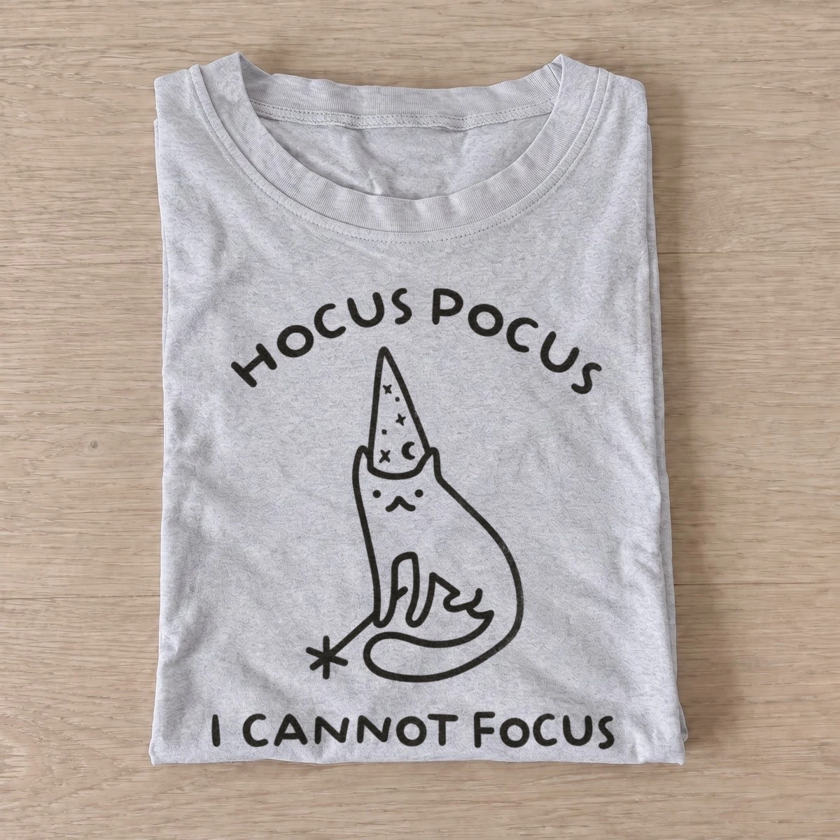 Wizard cat with an I Cannot Focus caption graphic T-shirt design