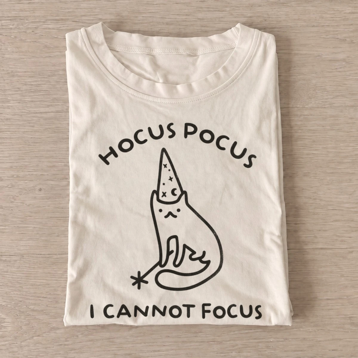 Wizard cat with an I Cannot Focus caption graphic T-shirt design