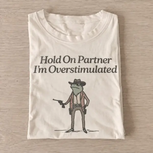 Hold on partner im overstimulated cowboy frog t shirt sand20overstimulated cowboy frog.webp