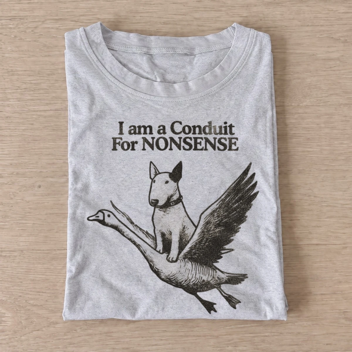 I am a conduit for nonsense dog riding goose t shirt gray20nonsense dog goose.webp