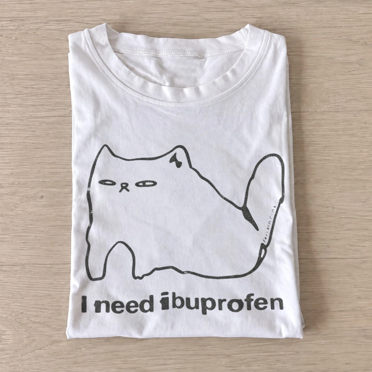 I need ibuprofen cat graphic t shirt white20need ibuprofen cat.webp