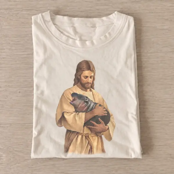 Jesus holding baby hippo t shirt sand20jesus and hippo.webp