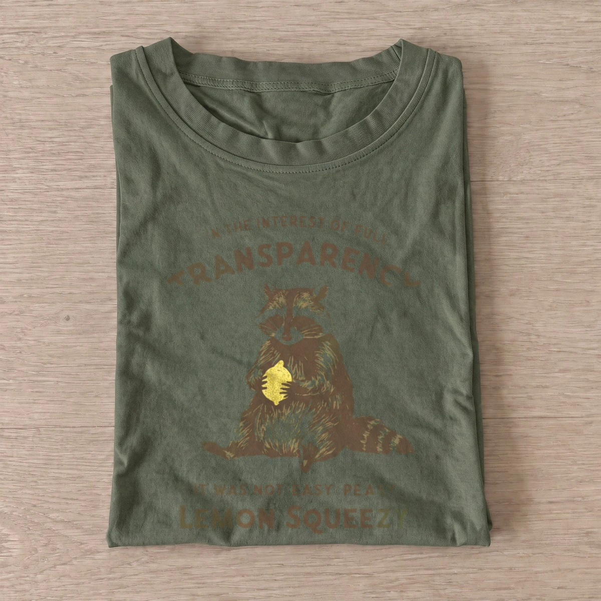 Lemon squeezy raccoon t shirt olive20lemon squeezy raccoon.webp
