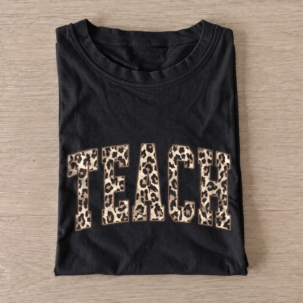 Leopard print teach t shirt black20leopard teach.webp