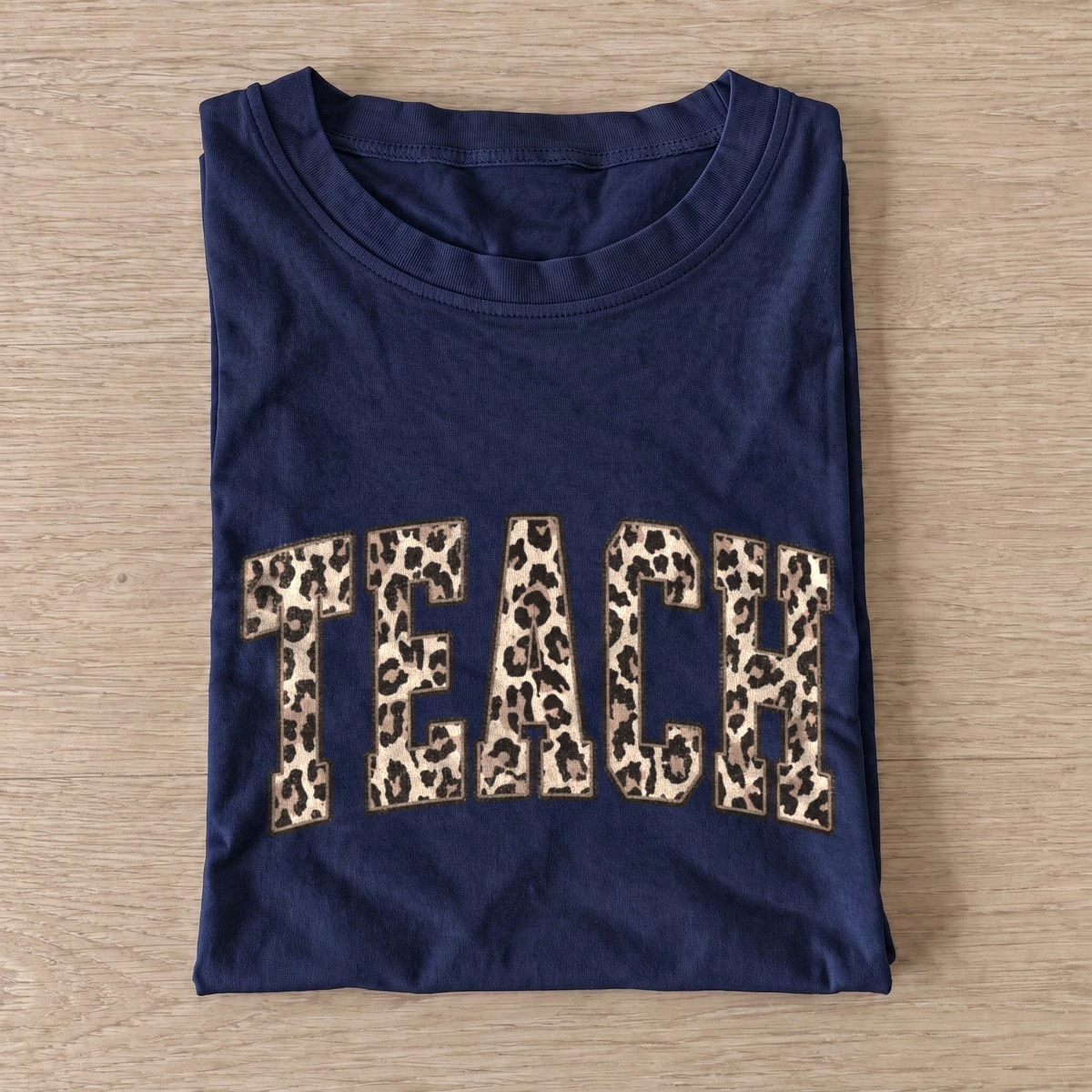 Leopard print teach t shirt navy20leopard teach.webp