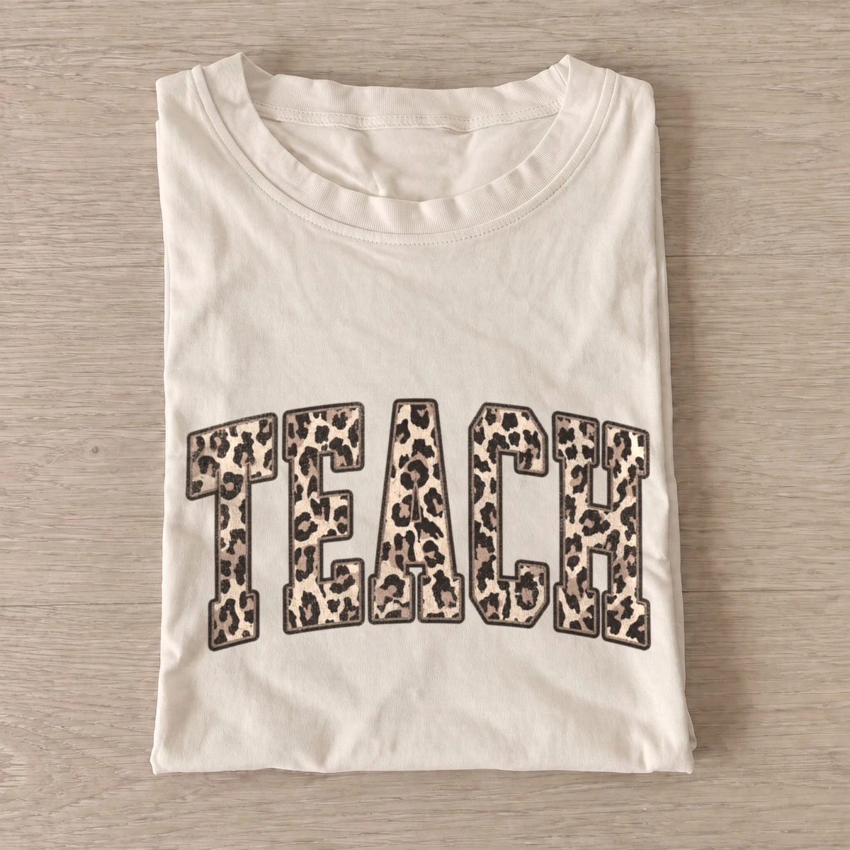 Leopard print teach t shirt sand20leopard teach.webp