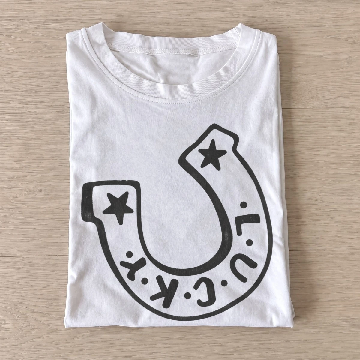 Lucky horseshoe t shirt white20lucky horseshoe.webp