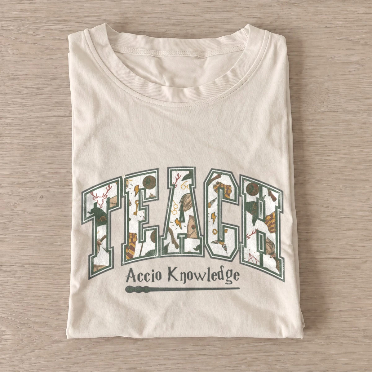 Magical teacher accio knowledge t shirt sand20magical teacher.webp