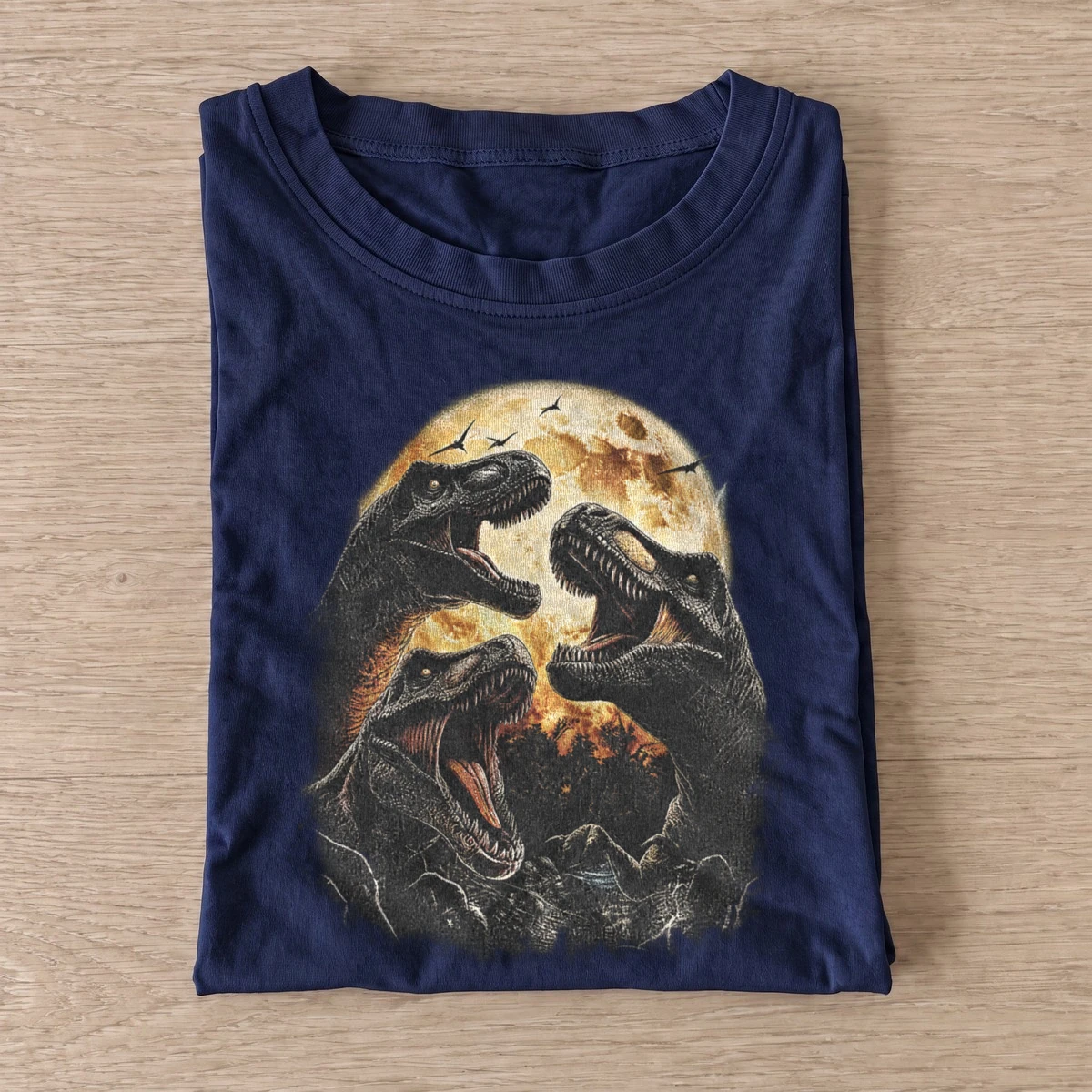 Moonlit dinosaur trio t shirt navy20moonlit dinosaur trio.webp