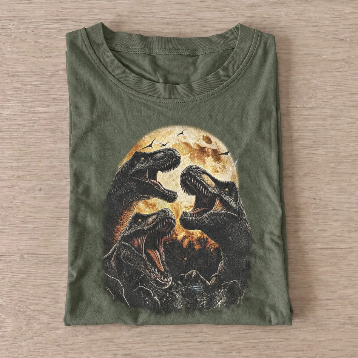 Moonlit dinosaur trio t shirt olive20moonlit dinosaur trio.webp