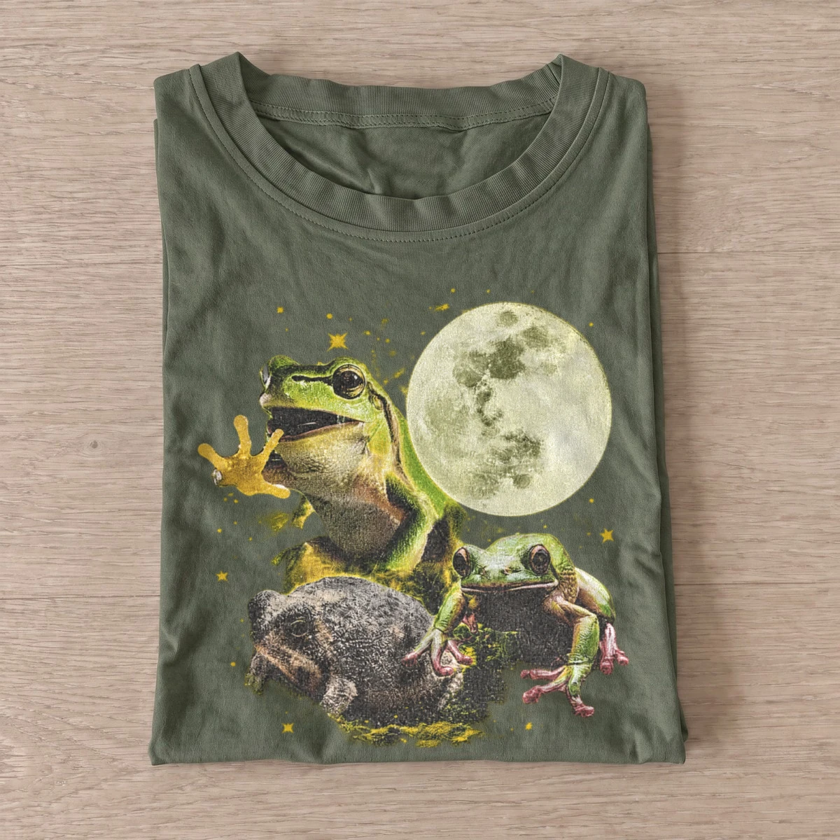 Moonlit frog trio graphic t shirt olive20moonlit frog trio.webp